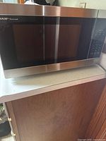 Front view of Sharp Carousel microwave on countertop