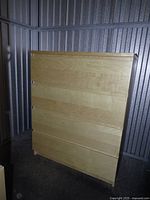 Front view of closed dresser showing overall condition and finish