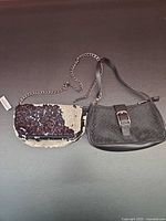 Both handbags side by side showing overall design and size comparison