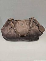 Full view of Prada mushroom brown pebbled leather hobo bag