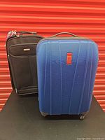 Both suitcases side by side