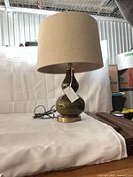 Full view of lamp showing double-gourd base, shade, cord