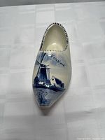 Top view showing windmill scene, "Friesland" text and overall glaze