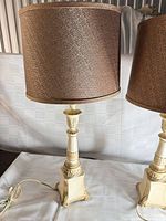 Front view of one lamp with shade showing overall design