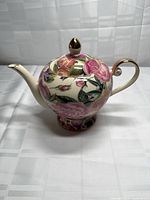 Left side view of Royal Albert floral chintz teapot with lid