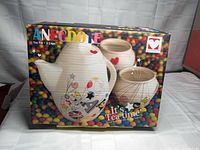 Front of boxed Loveramics Anecdote teapot and cups set