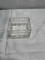 Top angle showing entire clear pressed glass dish