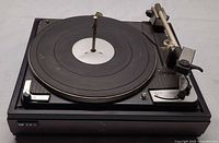 Full view of Dual 1010 changer in CS 16 plinth