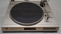Top view of Dual CS 630Q turntable showing platter, tonearm, dust cover