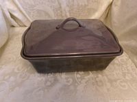 covered baking dish exterior showing lid and handles