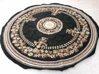 Full view of round oriental carpet