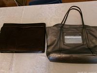 Both bags side by side on table