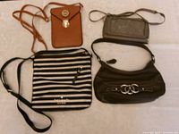 All four purses laid out