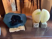 Plaque and pair of bookends together