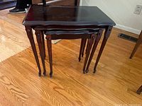 Front angled view of nested tables showing design and finish