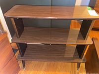 Full view of three-tier MDF shelving unit