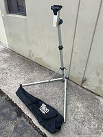 Full view of assembled Minoura aluminum repair stand with carry bag