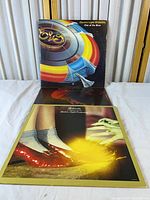 Both album jackets, Out of the Blue upright behind Eldorado gatefold