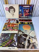 All eight LP covers laid out for full view