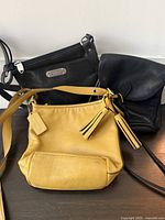 All three leather bags grouped