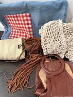 Denim bag with gingham pockets, suede fringe belt, leather belt