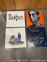 Front covers of four vinyl LPs: Beatles, Rolling Stones, America, Supertramp