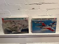 Both sealed model kit boxes side by side