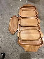 Full set showing large tray and four small trays