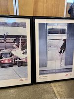 Both framed ballet posters standing side-by-side