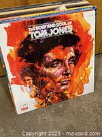 Front sleeve of Tom Jones LP at front of stack