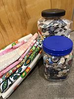 Folded fabrics with two button jars
