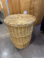 Full view of wicker hamper with lid closed