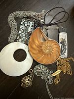 Group shot showing all pendants and chains