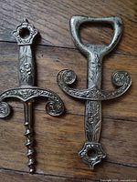 Corkscrew and bottle opener front view showing ornate design