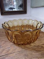 Top angled view showing amber color and scalloped form