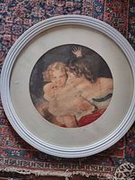 Front view of round framed print
