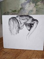 Front view of monochrome semi-nude figure painting on white wood panel