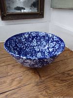 Top angled view of blue floral ceramic bowl