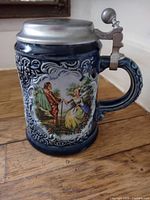 Front view showing relief decoration and figural scene