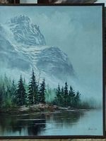 Full view of framed mountain landscape painting