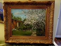 Front view of framed oil painting