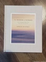 Front cover of the hardcover book showing beige cloth and photographic label