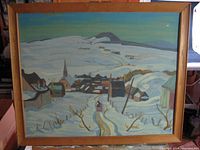 Full view of framed silkscreen winter village scene