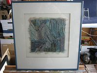 Front view of framed artwork showing overall appearance and frame