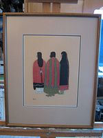 Full view of framed artwork with mat and wood frame