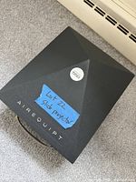 Top view of black Airequipt carrying case showing 550 badge and handle