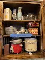 Cabinet interior showing all listed kitchen items