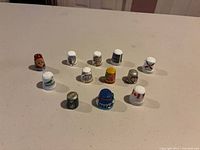 Front wide shot of all twelve thimbles