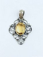 Front view showing citrine and filigree detailing