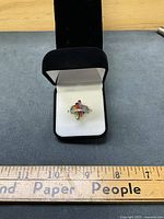 Ring in box showing overall design and scale